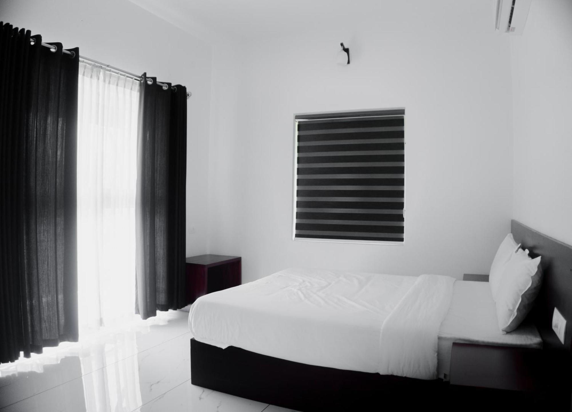Rockdale Resort Nilambūr Pokoj fotografie